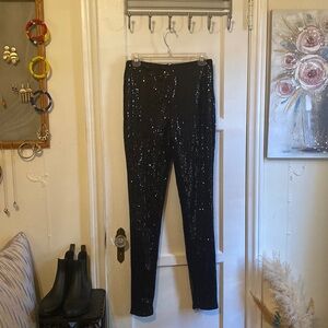 Forever 21 black sequin mid-rise leggings. Junior’s size medium.